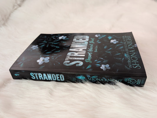 side view of stranded paperback