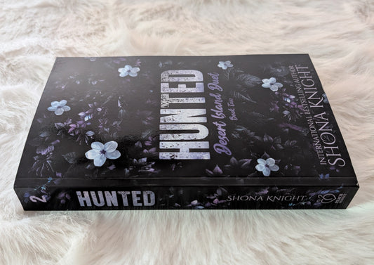 side view of hunted paperback